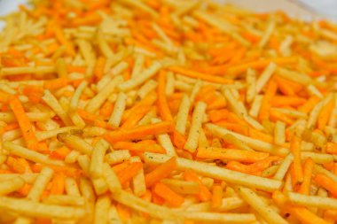 Gevrek patates yapışır. Cum. Patates kızartması doku. Patates cipsi. Tuzlu ve peynir kızartması. Fast food. Yukarıdan görüntüleyin. Ücretsiz yakın çekim.