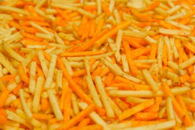 Gevrek patates yapışır. Cum. Patates kızartması doku. Patates cipsi. Tuzlu ve peynir kızartması. Fast food. Yukarıdan görüntüleyin. Ücretsiz yakın çekim.