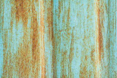 Paslı metal doku. Metal korozyon. Yüzeyin boya ile boyanmıştır. Metal zarar. Pas.