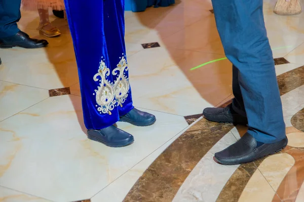 Kazakh customs and traditions. Circumcision. A boy in a Kazakh national costume sitting on a horse. Kazakh national costume is blue. The Kazakh custom: SUNDET Toi.