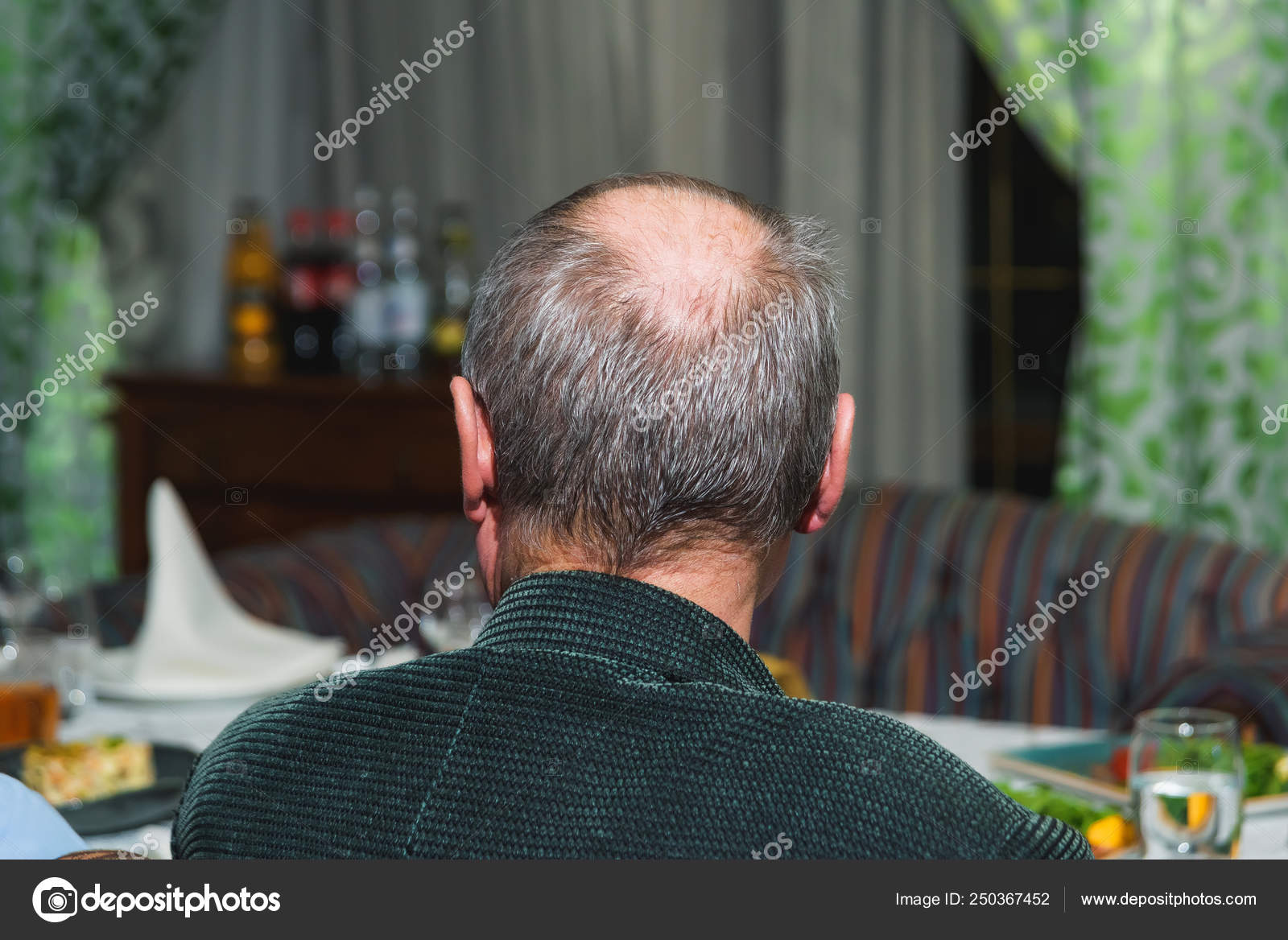 Man White Hair Bald Spot Old Man Green Shirt Sitting Stock Photo