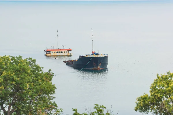 Sunken ship at the shore. Black Sea. Walk along the promenade. A large sunken ship.