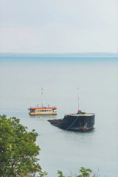 Sunken ship at the shore. Black Sea. Walk along the promenade. A large sunken ship.