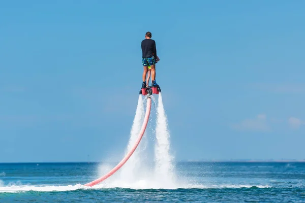 Water Extreme Sport Guy Flying Aquatic Flyboard Extreme Rest Sea Royalty Free Stock Images
