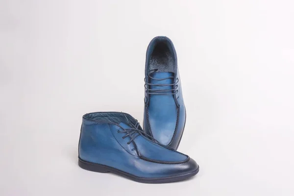 Blue men\'s shoes. Men\'s shoes on a white background. Casual shoes. Comfortable men\'s shoes
