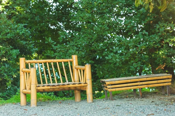 View of the black sea from the observation deck of the Botanical garden. Rest in Georgia. Botanical garden in Batumi. Walk in the Park. Wooden benches made of bamboo.