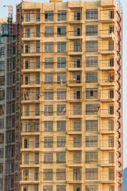 Batum'da çok katlı binaların inşaatı. Binalarda iskele. Katlı binalarda onarım çalışmaları. Gürcistan'da dinlenme.