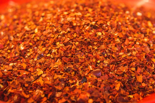 Traditional Georgian spice mix  Khmeli suneli. Spicy mixture is an ingredient of traditional Georgian dishes and sauces. Spices in a bag on the market in Georgia.The texture of the spice mixture.