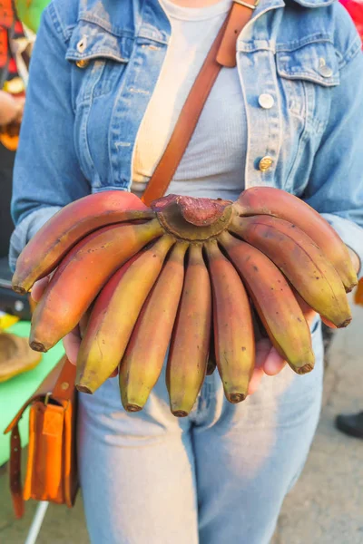 Girl Denim Holding Hands Red Bananas Fruit Hands Girl Bananas — Stock Photo, Image