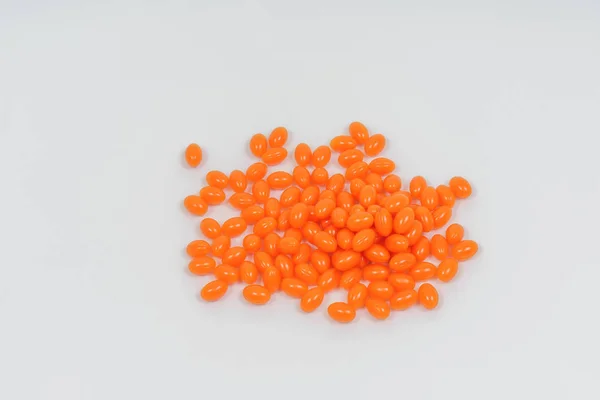 Πορτοκαλί Χρώμα Υγρό Veggi Μαλακό Ζελέ Λευκό Φόντο Διαιτητικά Συμπληρώματα — Φωτογραφία Αρχείου