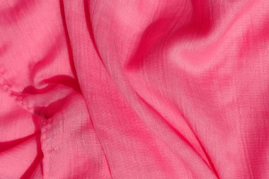 Pembe kumaş dokusu. Pembe soyut arka plan. Açık pembe kumaş closeup.