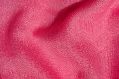 Pembe kumaş dokusu. Pembe soyut arka plan. Açık pembe kumaş closeup.