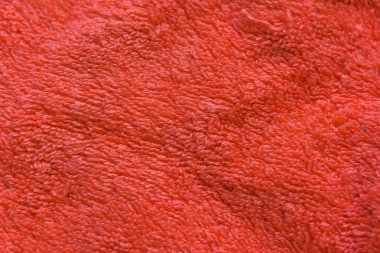 Havlu turuncu havlunun dokusu. Mercan kumaşı. Closeup tekstil ürünleri