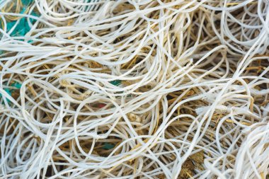 Beyaz plastik ip dokusu. Karışık plastik halat.