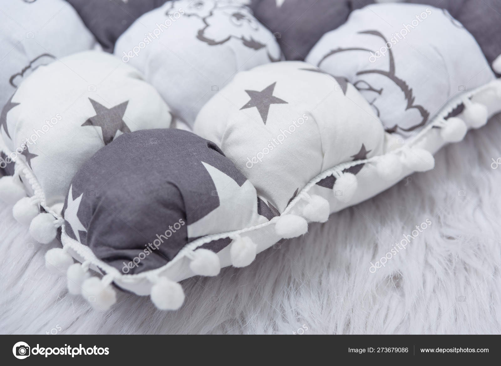 white cot with mattress