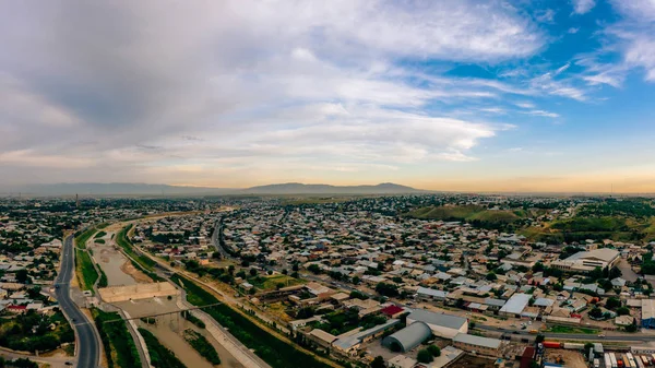 Panorama of the industrial part of the city of Shymkent. Sunset over the city of Shymkent. Surroundings of the Turkestan region