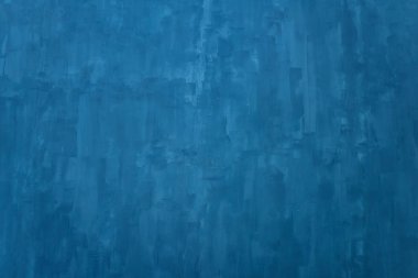 Mavi duvarın dokusu. Duvara macun sanatsal uygulama. Fotoğraf stüdyosunda dekoratif duvar