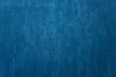 Mavi duvarın dokusu. Duvara macun sanatsal uygulama. Fotoğraf stüdyosunda dekoratif duvar