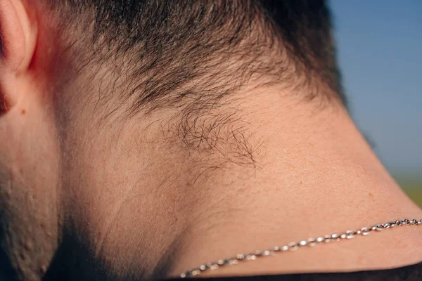 The black hair on the man's neck had grown back. Close-up of the back of  the guy's head. Hair on the back of the head and neck - Stock Image -  Everypixel