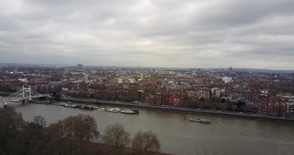 4K Air panoramic view of Central London, River Thames, Battersea Park and Chelsea Bridge UHD — стоковое видео