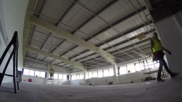 Construction, installation of suspended grid ceiling timelapse 4K — Stock Video