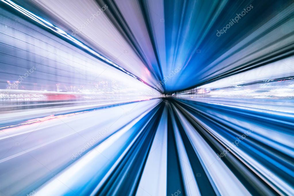 Motion blur of train moving inside tunnel in Tokyo, Japan