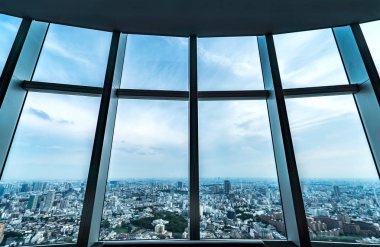 People silhouette inside Observation Deck. Tokyo, Japan. clipart