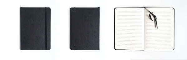 Cuaderno negro sobre fondo blanco con ruta de recorte — Foto de Stock
