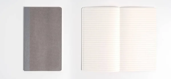 Grijze notebook geïsoleerd op witte achtergrond. bovenaanzicht — Stockfoto