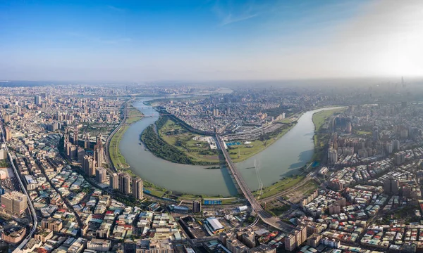 Taipei City Aerial View - Asia business concept image, panoramic modern cityscape building birds eye view under sunrise and morning blue bright sky, shot in Taipei, Taiwan.