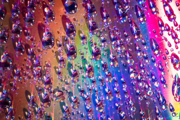 Gotas Água Meio Dvd Gotas Água Fundo Colorido — Fotografia de Stock