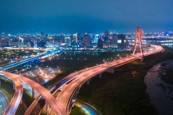 Taiwan, New Taipei City, the beautiful twists and turns of the river, reflecting the sky, bridges, city beautiful scenery.