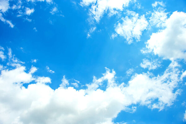 Sky and clouds during the daytime in the summer. blue sky background with tiny clouds. blue sky with white cloud