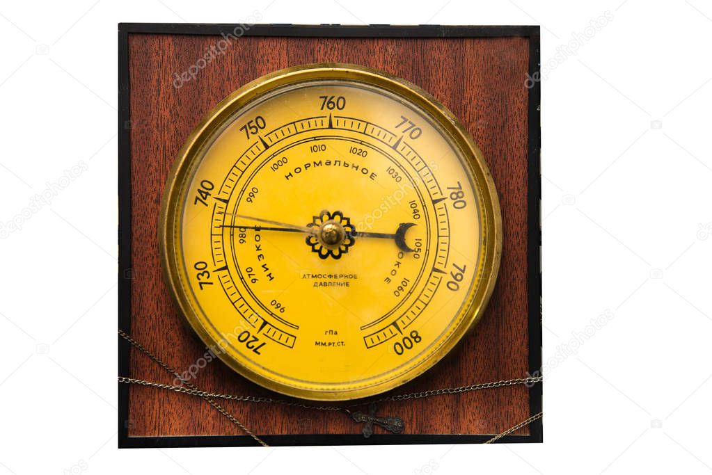 The vintage wooden barometer isolated on white background