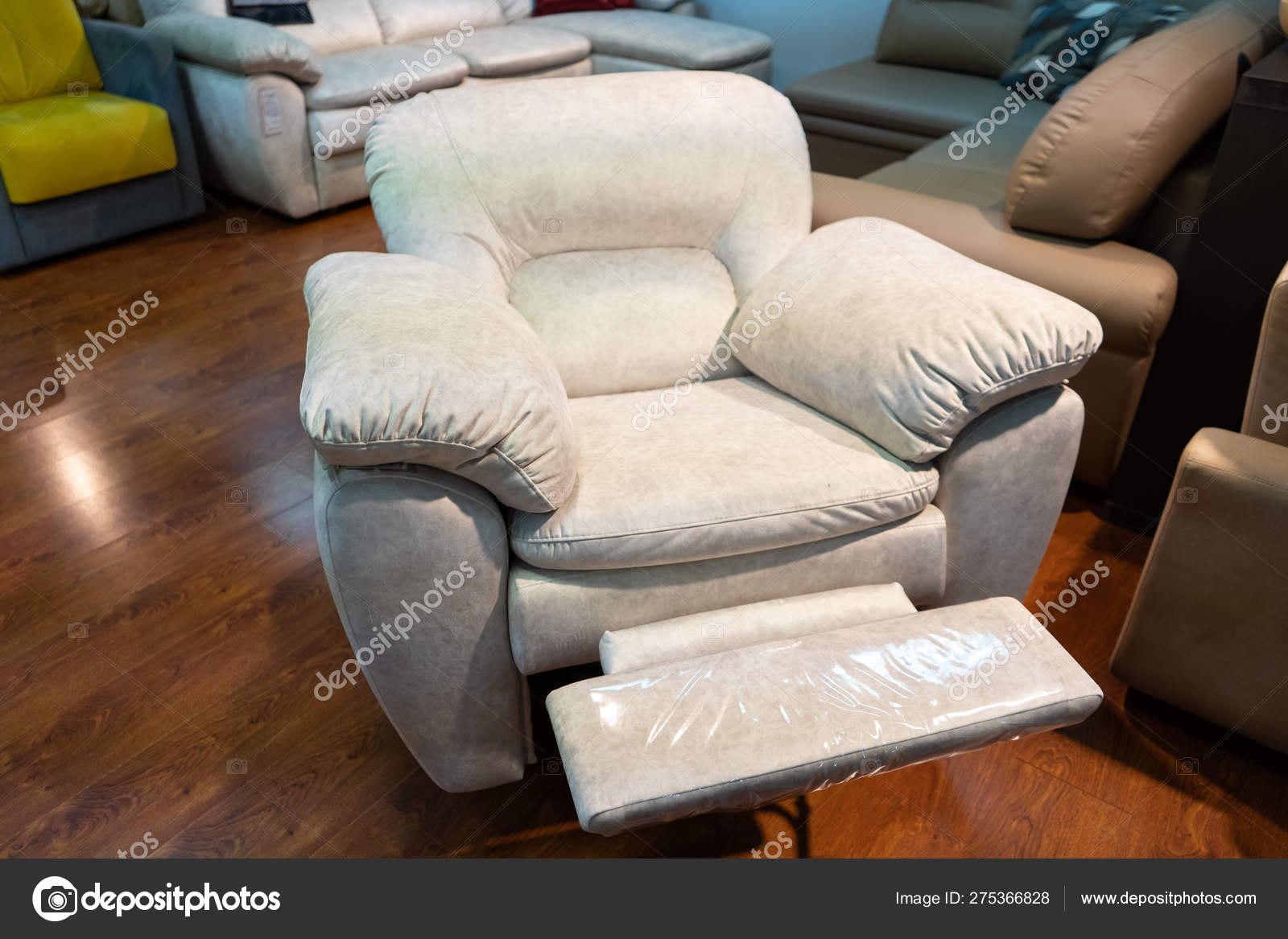 new leather chair in the store sofas and chairs are exhibited in the  furniture store sale 275366828