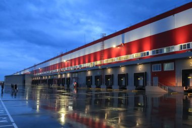 İnşaat ve büyük lojistik merkezi, iç dolgu ve kaplama, dış bölge oluşumu ve ambar ve ofis alanı düzenlenmesi süreci başlatma işlemi