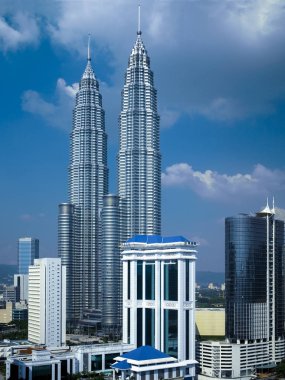 Modern architecture of the Petronas Twin Towers in Kuala Lumpur, Malaysia. clipart