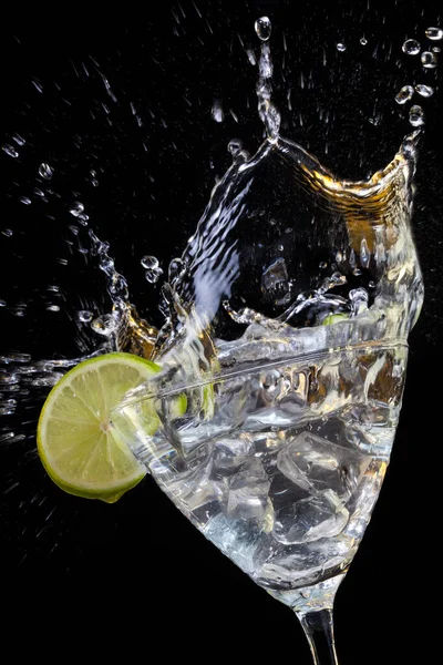 Ice Cubes Splashing Vodka Martini — Stock Photo, Image
