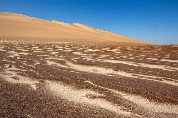 Desert sand dunes on the Skeleton Coast in Namibia, Africa.