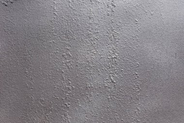 Gri yumuşak metal yüzey. Tasarım çalışması, arkaplan metni, resimler, afişler, reklam panoları için elverişli