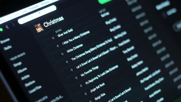 Spotify Browsing Good Classic Christmas Carols — Vídeo de stock