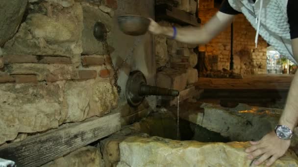 Young Man Drinking Water Ancient Fountain — Stock Video