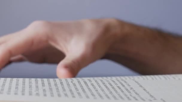 Man Reads Book Closeup — Stock Video
