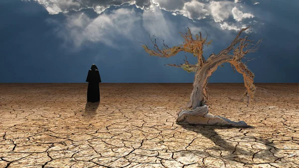 Figure Black Cloak Stands Arid Land — Stock Photo, Image