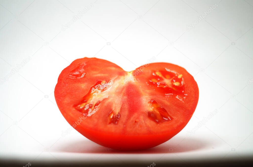 Fresh tomato on white background