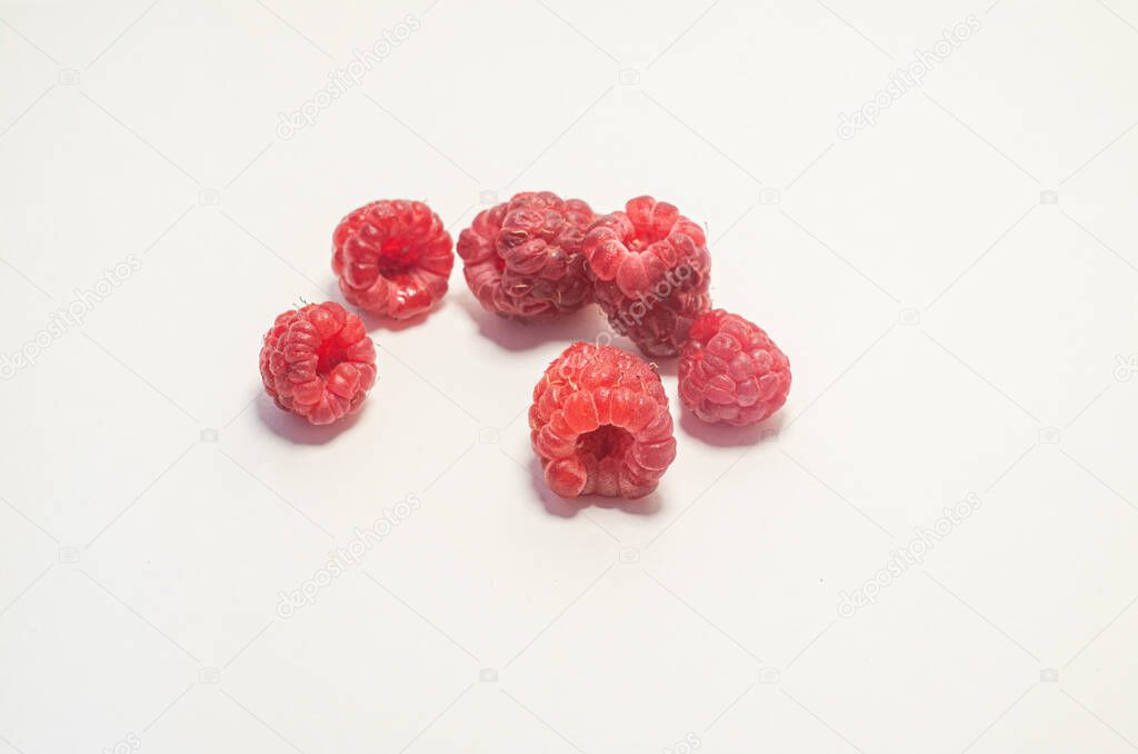 Raspberries isolated on white background, close-u