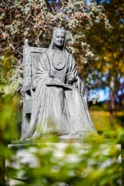 Madrid, Spain - September 29, 2020: Statue of the nun and writer of Mexico sor Juana Ines de la Cruz. clipart