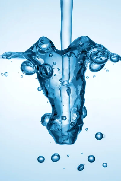 Брызги Воды Шипучая Жидкость Пузырьками Выливающимися Стеклянный Сосуд — стоковое фото