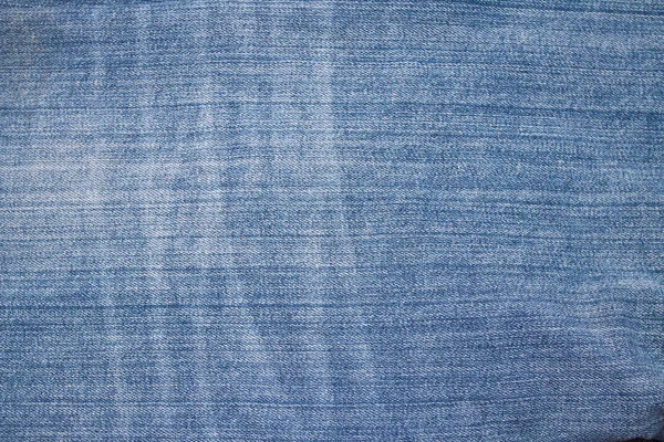 Textur av blå jeans textil närbild — Stockfoto