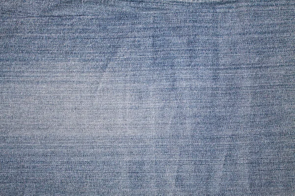 Textur av blå jeans textil närbild — Stockfoto